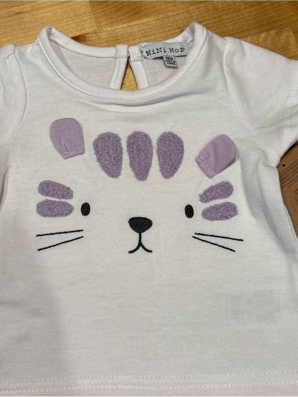 Mini Hop White Short Sleeve Tee with Lavender Kitty Appliqué - Source Unknown